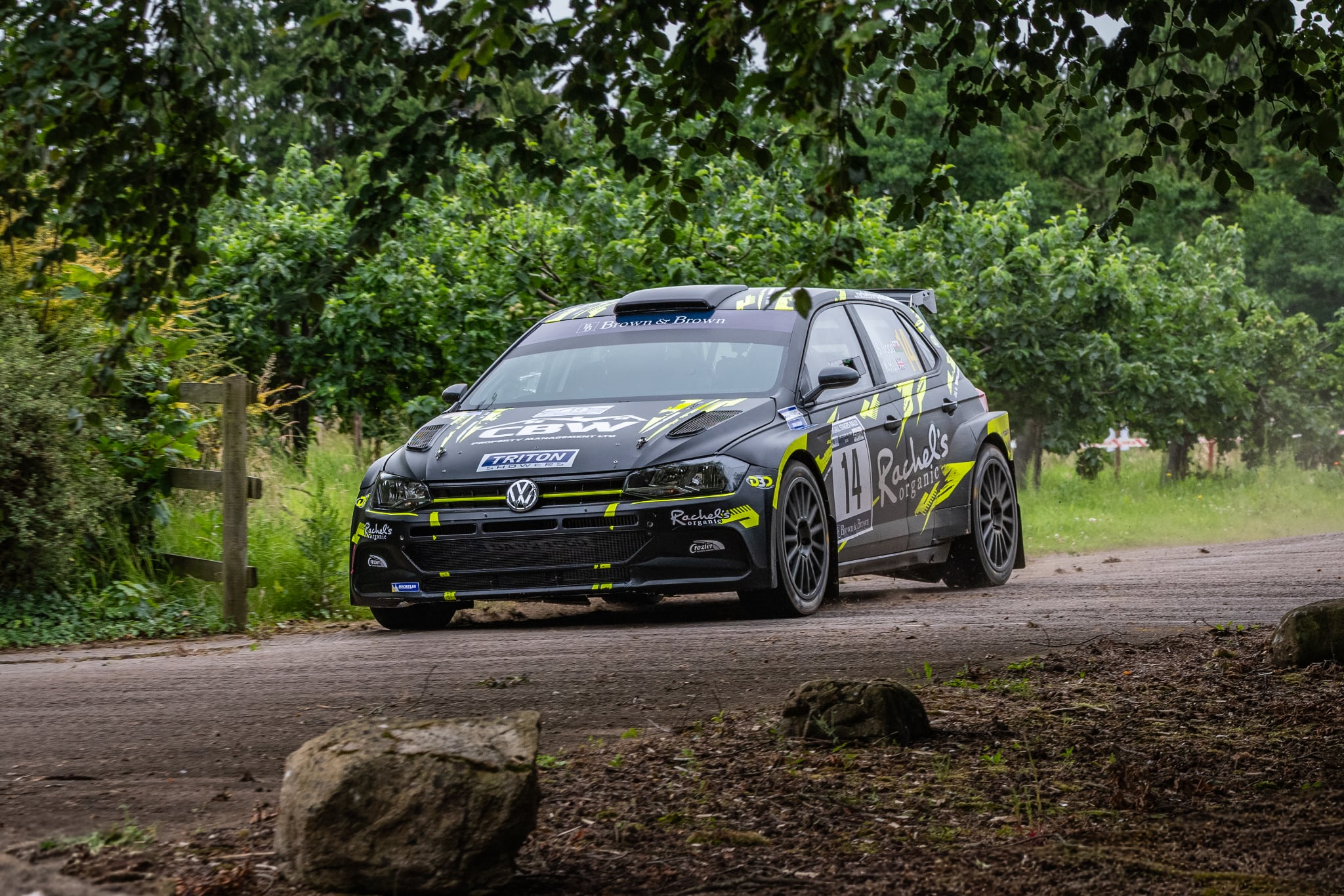Rally car on a narrow forest road