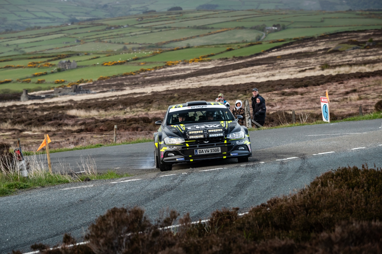 Rally car on a remote moorland road